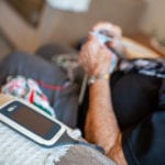 Continuous home monitoring using mhealth system pre- and post-TAVI cardiac procedure